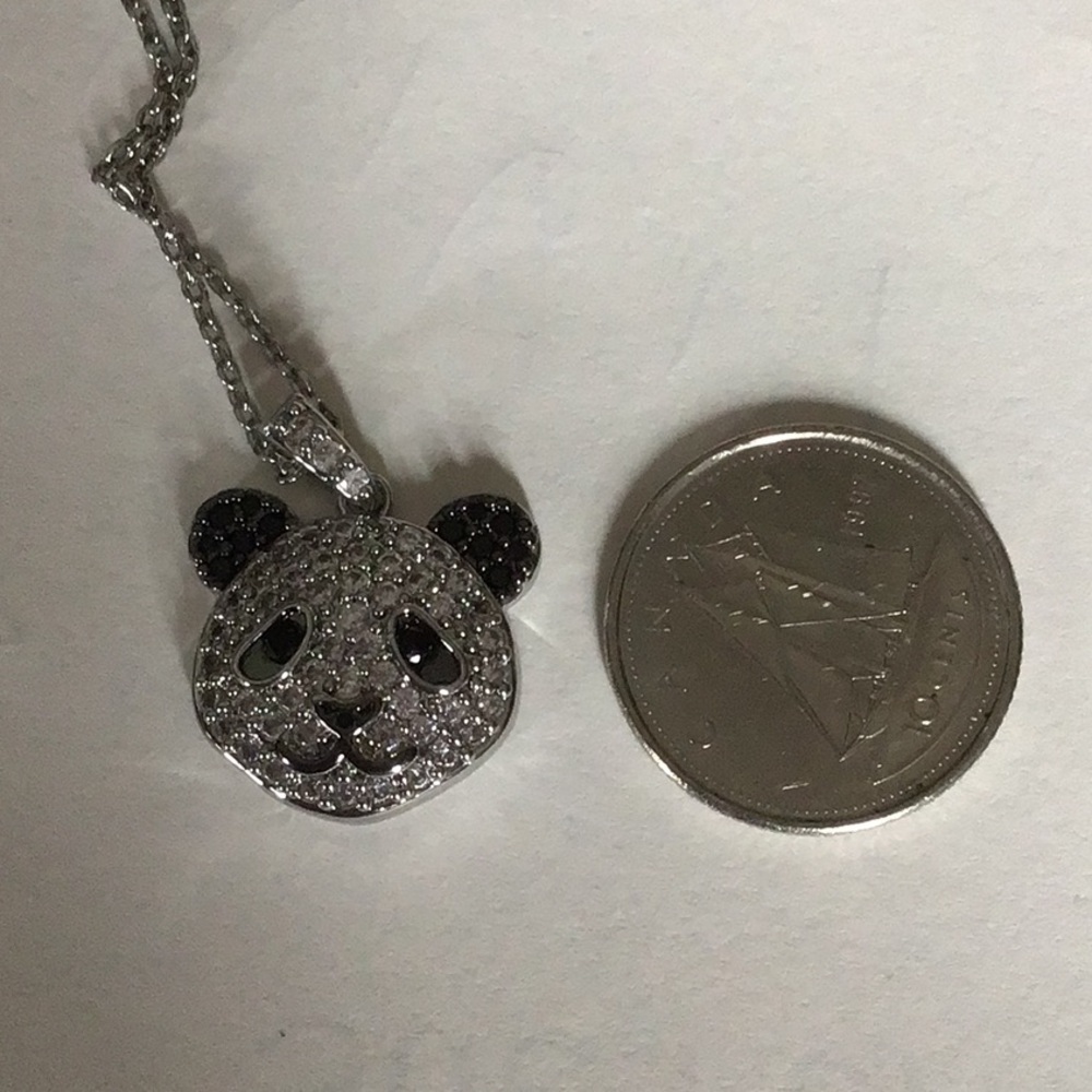 2/$15 Charmed Aroma panda necklace. Black and clear stones